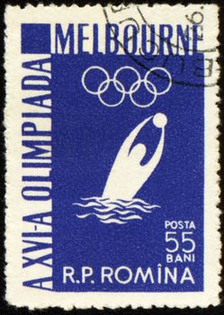 ROMANIA - CIRCA 1956: A post stamp printed in Romania shows water polo player, devoted to Olympic games in Melbourne, series, circa 1956