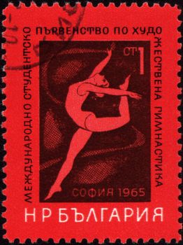 BULGARIA - CIRCA 1965: A stamp printed in Bulgaria shows free callisthenics, devoted to International Student 

championship, circa 1965