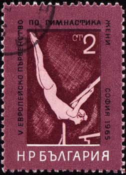 BULGARIA - CIRCA 1965: A stamp printed in Bulgaria shows female gymnast, devoted to European championship on gymnastics, circa 1965