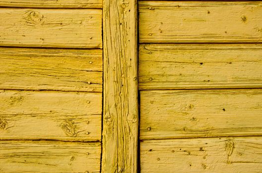 Old wooden painted wall architectural backdrop. Nails and old boards.