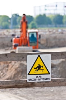 Sign of danger for work in progress (Italian) in a building site