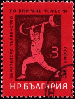 BULGARIA - CIRCA 1965: A stamp printed in Bulgaria shows weight kifter, devoted to European championship in heavy athletics, circa 1965