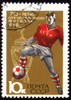 USSR - CIRCA 1968: A stamp printed in the USSR shows footballer, devoted to 70th anniversary of soviet football, circa 1968
