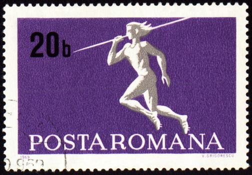 ROMANIA - CIRCA 1969: A post stamp printed in Romania shows javelin throwin, series, circa 1969