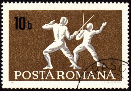 ROMANIA - CIRCA 1969: A post stamp printed in Romania shows fencing, series, circa 1969