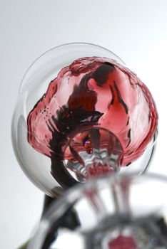 Vine pouring in a glass captured from unusual point of view stock photo