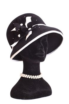 Head a dummy in a hat with beads isolated on white