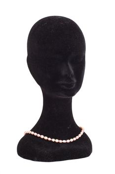 Head a dummy with beads isolated on white