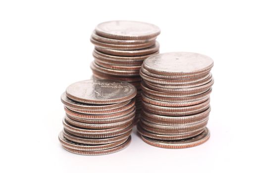 Stacks of coins isolated on white