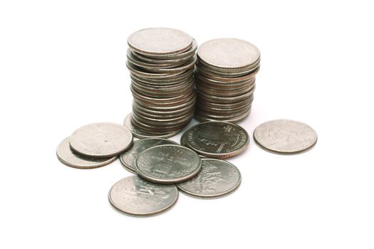 A pile of US Coins shot on a white background