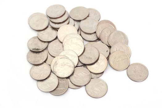 A pile of US Coins shot on a white background