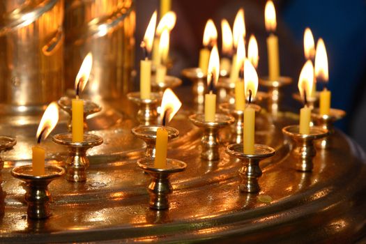 Church wax candles on a candlestick