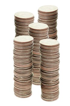Stacks of coins isolated on white