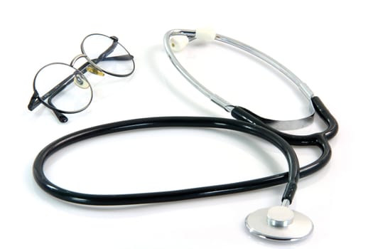 spectacles and auscultation phonendoscope health and medical objects isolated on white background