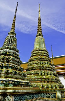 A mosiac colored wat in the center of Bangkok, Thailand on a sunny day