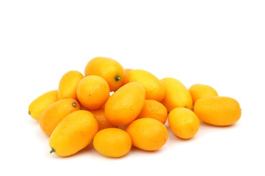 kumquat close up isolated on white