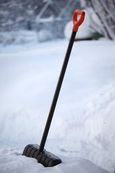 shovel in snow on nature