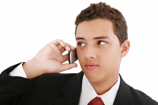 Close-up of attractive young businessman on cellphone. Nineteen years old.