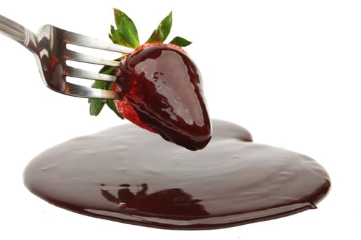 strawberry in chocolate  isolated on white