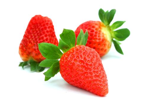 strawberry pile isolated on white background