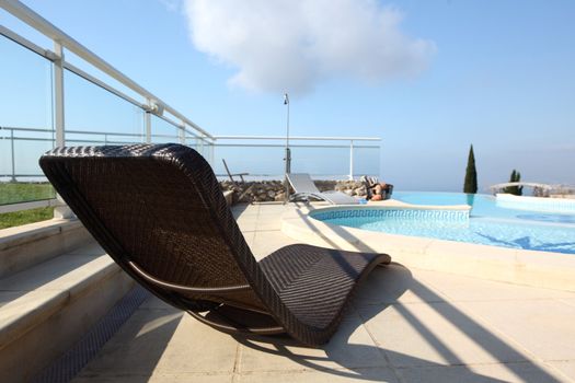  chaise lounge near the pool