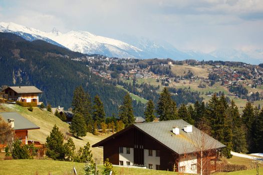 chalet in alpine mountains