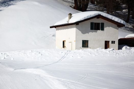 chalet in alpine mountains
