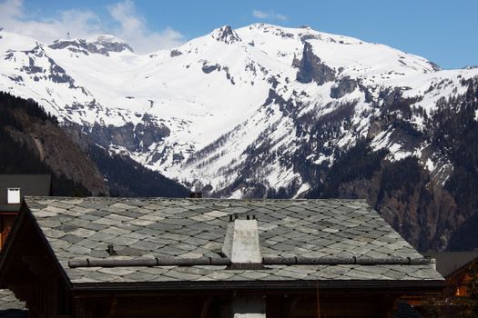 chalet in alpine mountains