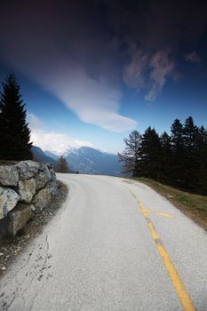 mountain road under blue sky