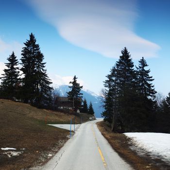 mountain road under blue sky