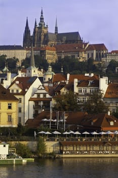 A distant view of the castle and prague from the famous bridge