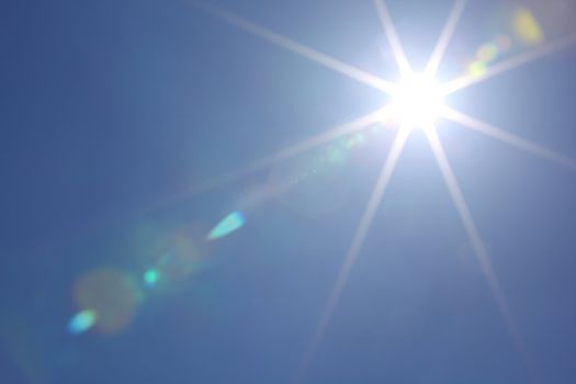 sun in blue day sky