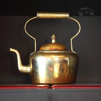 tea in brass pot close up