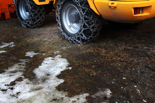 chain on the wheel of the tractor