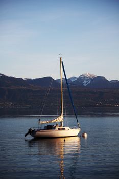 yacht in lake of geneva landscape on sunrise