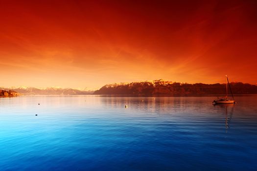 yacht in lake of geneva landscape on sunrise
