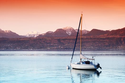 yacht in lake of geneva landscape on sunrise