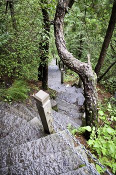 Stone stairs on a steep mountain pathway in a national park in china