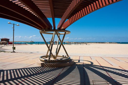 Modern design pergola gazebo pavilion in a summer beach coast resort