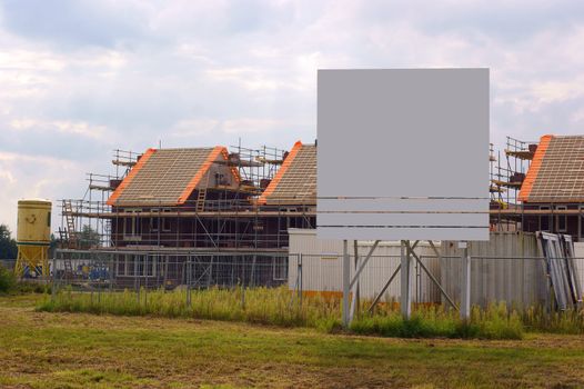 House construction, with empty sign