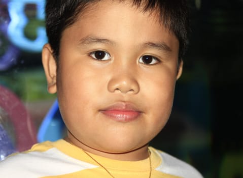 Photo of adorable young boy close up.