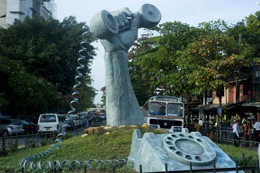  Colombo, Sri Lanka -  February 22,2011: Statue of a phone in a hand, Colombo, Sri Lanka
