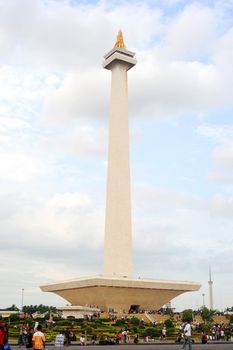 Jakarta,Indonesia - March 3, 2011: people at  National Monument l (Monas) is a 433 ft (132 meter) tower in the center of Merdeka Square, Central Jakarta, symbolizing the fight for Indonesia's independence