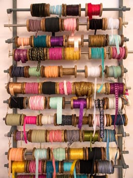 Variety selection of decorative colorful ribbons in hand craft shop
