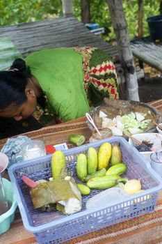 Java,Indonesia-April 21,2011:A   woman selling fast food on the   Java island