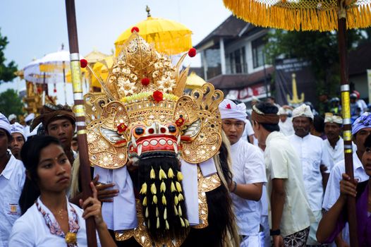 Ubud, Bali island, Indonesia - April, 29, 2011: Unidentified local people wearing in traditional indonesian clothes take part in Wayang Ceng Blonk ceremony .
