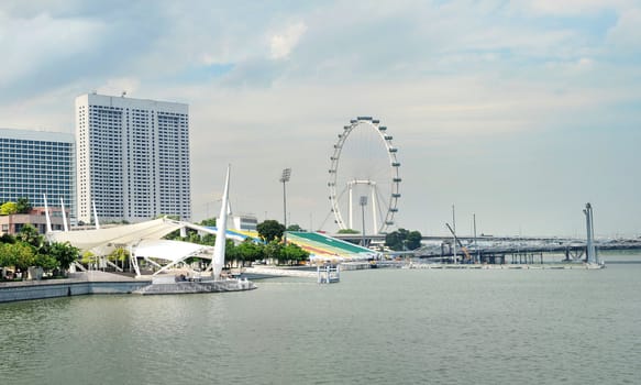 Embankment of Singapore and Singapore Flyer in the sunshine day