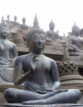 Buddhist statue in Gangaramaya Temle. Sri Lanka