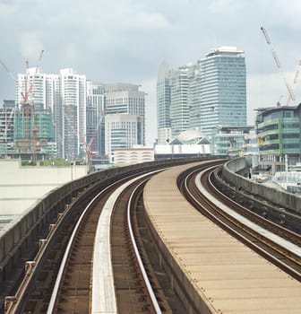 Cityscape with railway and high office buildings in Kuala Lumpur, Malaysia