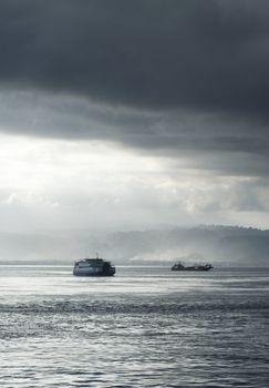 Ferry from Java to Bali under the storm. Indonesia